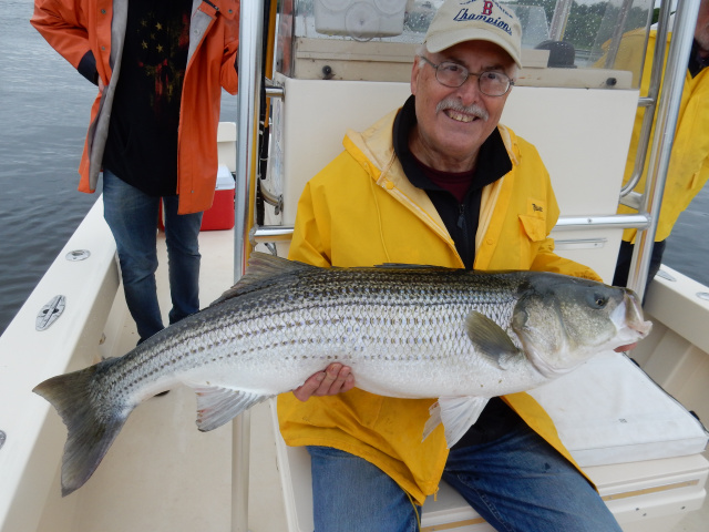 Joe Pinkos with his giant striper